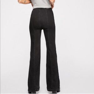 Free people pull on black flare pants. Penny
